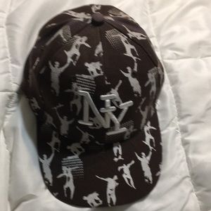 New York hat cap color brown white graphic made out of wool and acrylic